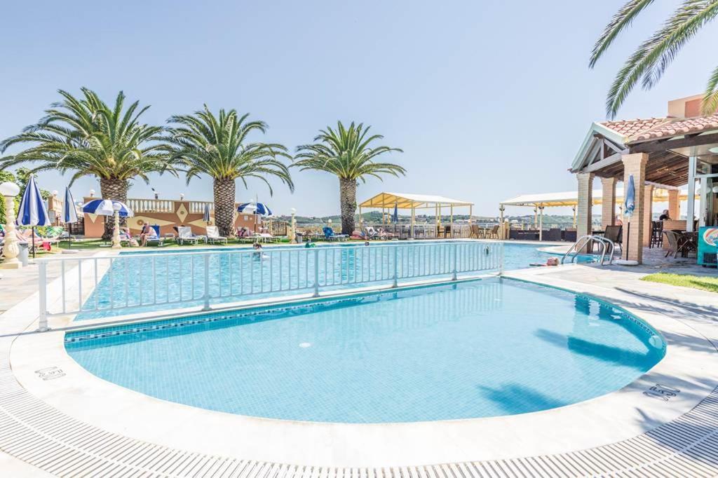 Kapetanios Apartments Агиос Стефанос Экстерьер фото