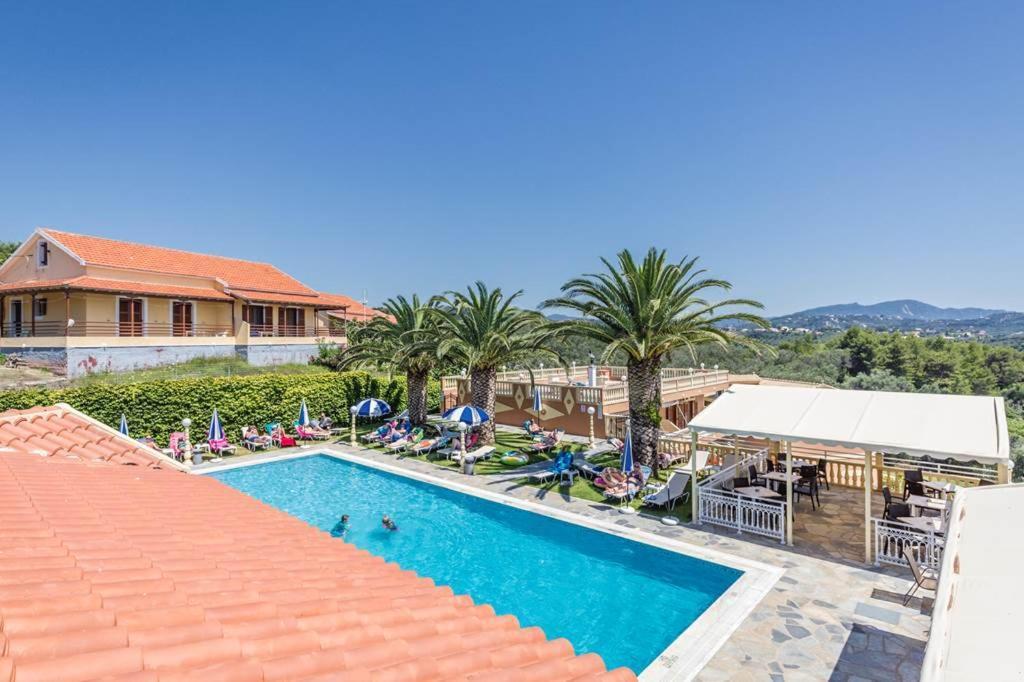 Kapetanios Apartments Агиос Стефанос Экстерьер фото